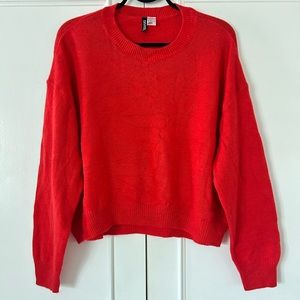 H&M divided orangey red cropped crewneck pullover sweater. Size XL.